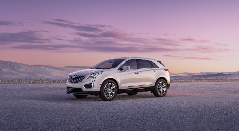 A white 2022 Cadillac XT5 is shown from the side.