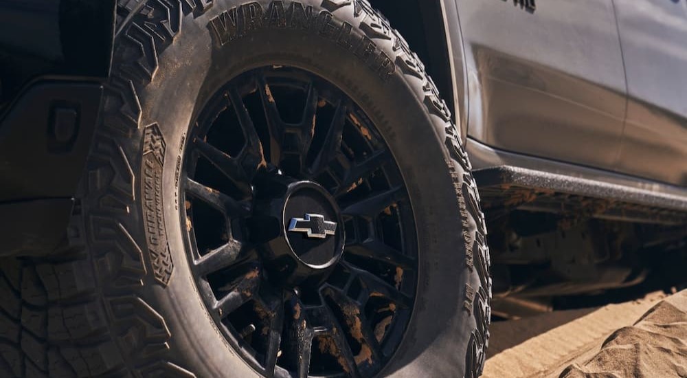 The wheel of a 2024 Chevy Silverado 2500 HD is shown.