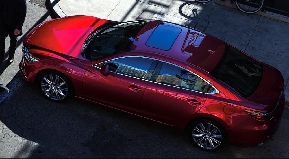 An aerial view of a parked red 2020 Mazda 6 is shown