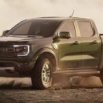 A green 2024 Ford Ranger Raptor is shown driving off-road.