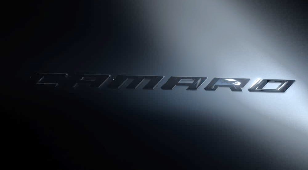 The badge of a 2024 Chevy Camaro is shown.