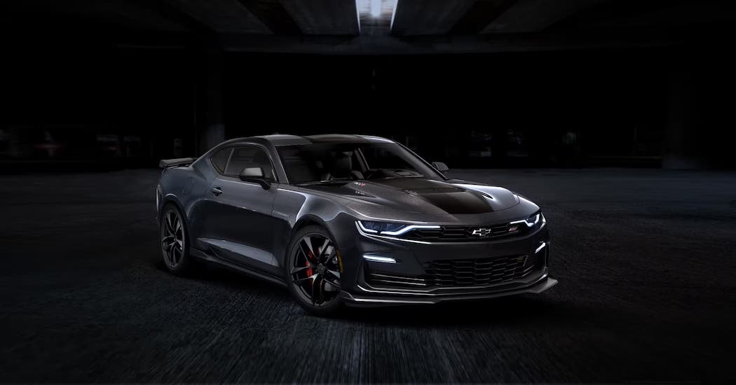 A black 2024 Chevy Camaro ZL1 is shown parked.