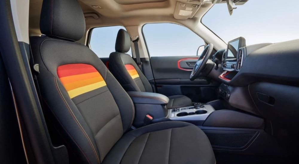 A close up shows the black and multicolored interior or a 2024 Ford Bronco Sport Free Wheeling.