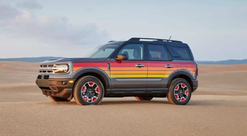 A multicolored 2024 Ford Bronco Sport Free Wheeling is shown from the side.