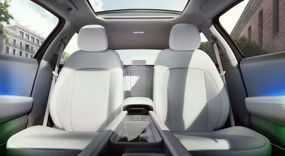The white interior of a 2023 Hyundai IONIQ 6 is shown.