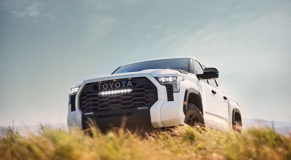 A white 2023 Toyota Tundra TRD Pro is shown from the front at an angle.