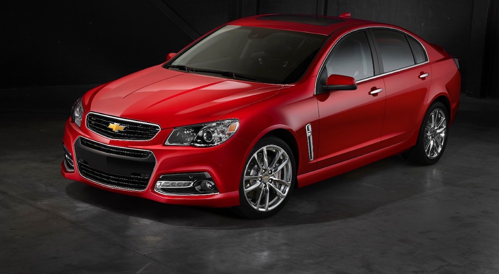 A red 2015 Chevrolet SS is shown parked.