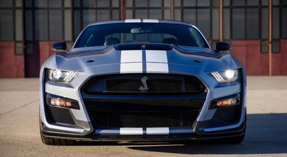 A blue-and-white 2022 Ford Mustang Shelby GT500 is shown parked.