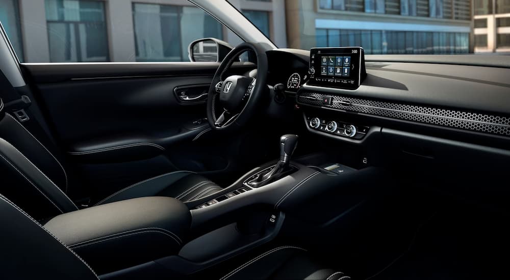 The black interior of a 2024 Honda HR-V is shown.