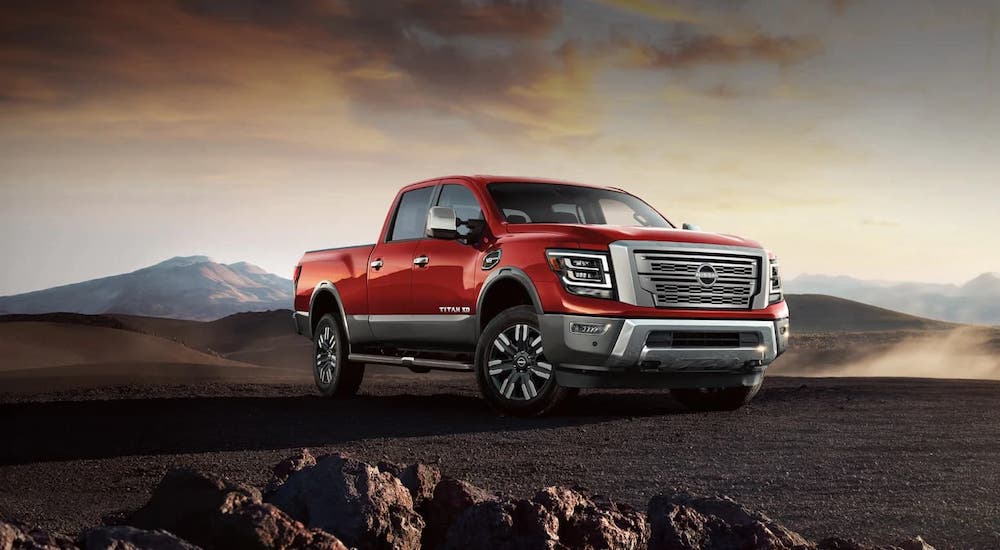 Clash Of The Titans The 2024 Nissan Titan Vs 2024 Ford F 150   2024 Nissan Titan XL Red 