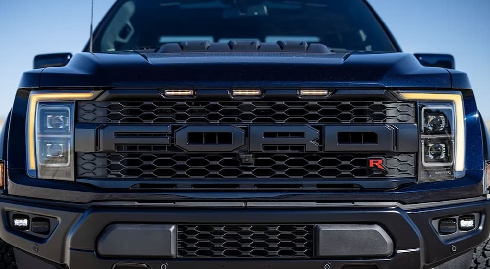 A close-up of the grille of a 2023 Ford F-150 Raptor R is shown.