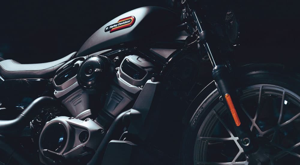 A close-up on the side of a black 2023 Harley-Davidson Nightster Special is shown.