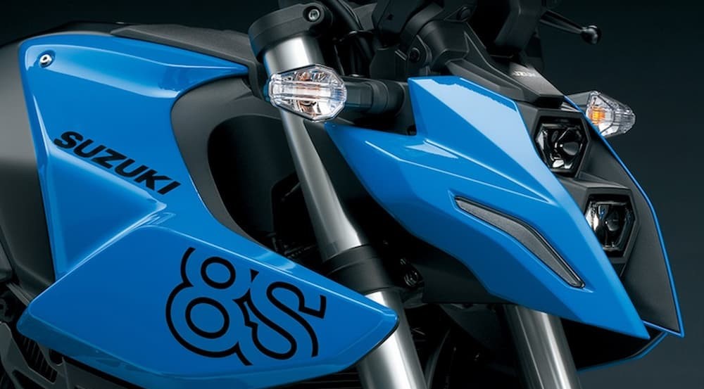 A close-up of the front of a blue 2023 Suzuki GSX-8S is shown.