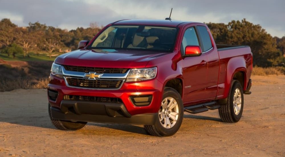 A red 2017 Chevy Colorado ZR2 is shown parked off-road.