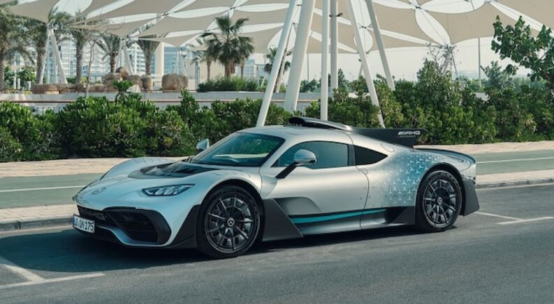 A 2023 Mercedes-AMG ONE is shown parked on a parking spot.