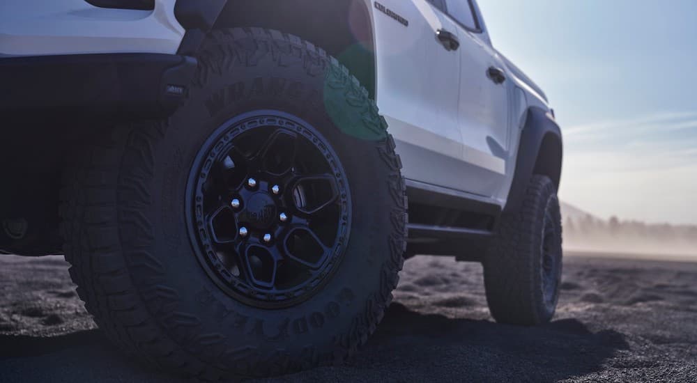 A close-up on a wheel on a white 2024 Chevy Colorado ZR2 Bison is shown.