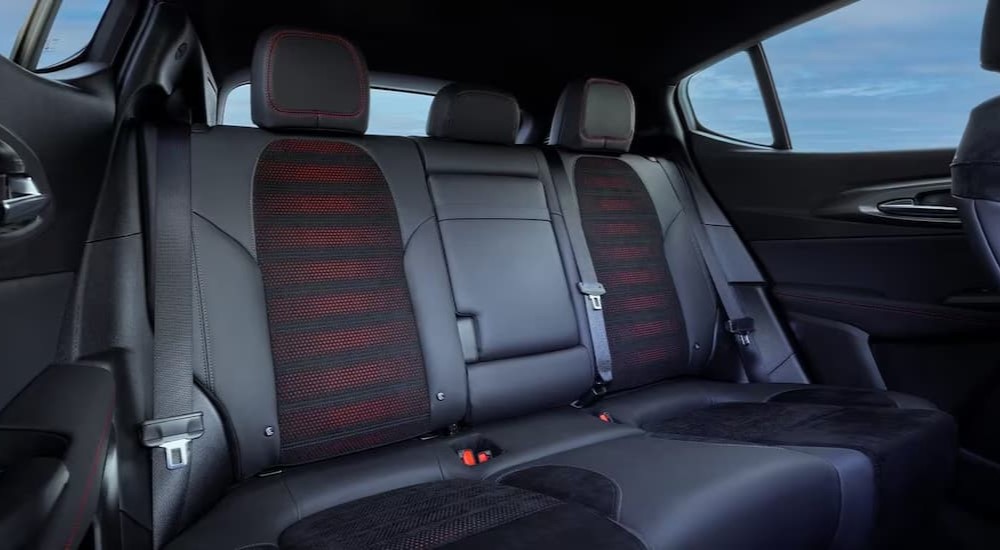 The black and red interior in a 2024 Dodge Hornet is shown.