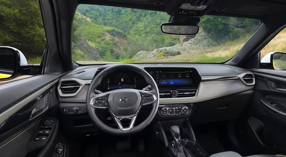 The black and gray interior and dash in a 2024 Chevy Trailblazer ACTIV is shown.