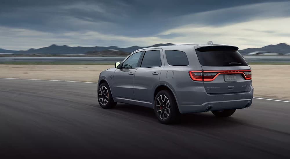 A grey 2022 Dodge Durango Hellcat is shown from the rear at an angle.