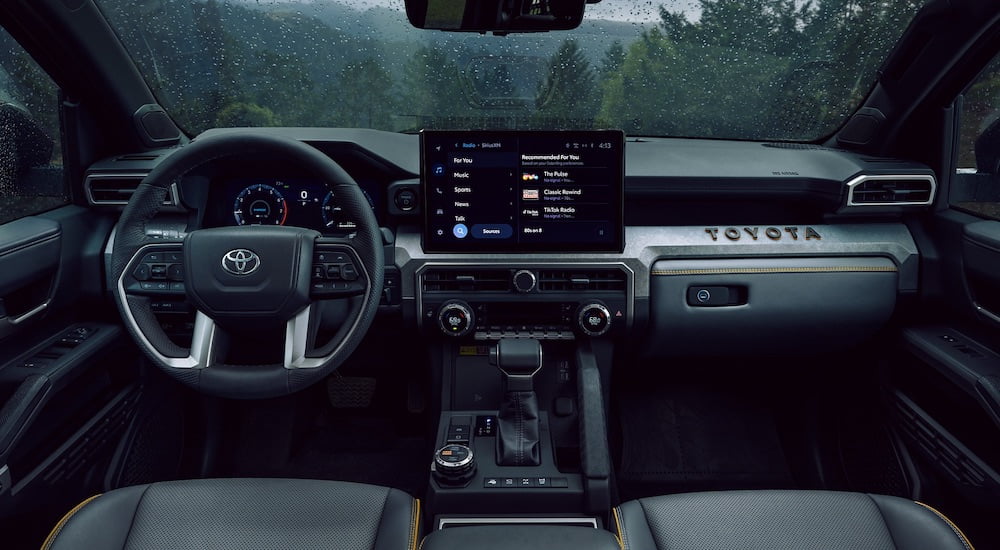The black interior of a 2025 Toyota 4Runner is shown from above the center console.