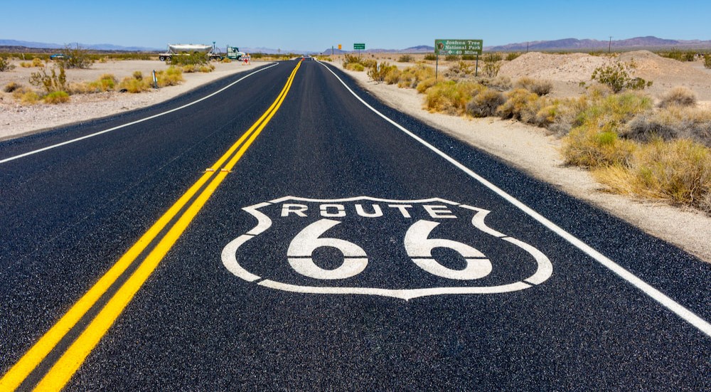 Route 66 is shown painted on a highway.