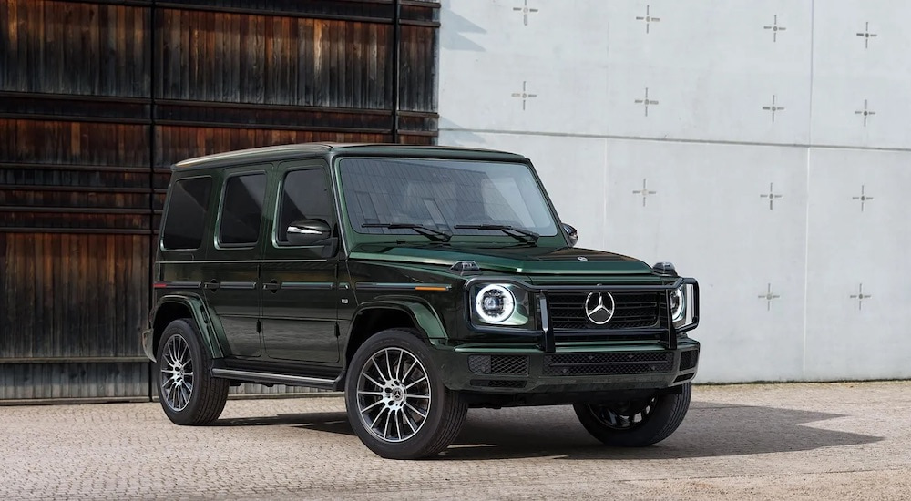 A green 2024 Mercedes-Benz G Class is shown from the front at an angle.