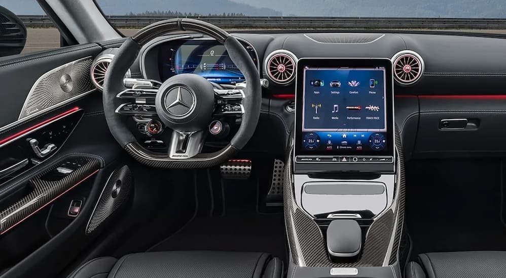 The gray interior and dash in a 2024 Mercedes-AMG GT is shown.