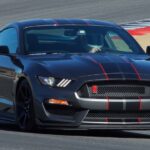 A grey 2017 Ford Mustang Shelby GT350 is shown from the front at an angle.