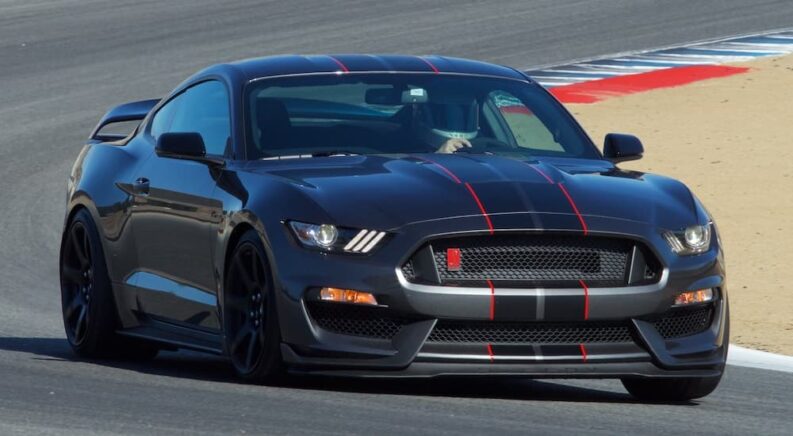 A grey 2017 Ford Mustang Shelby GT350 is shown from the front at an angle.