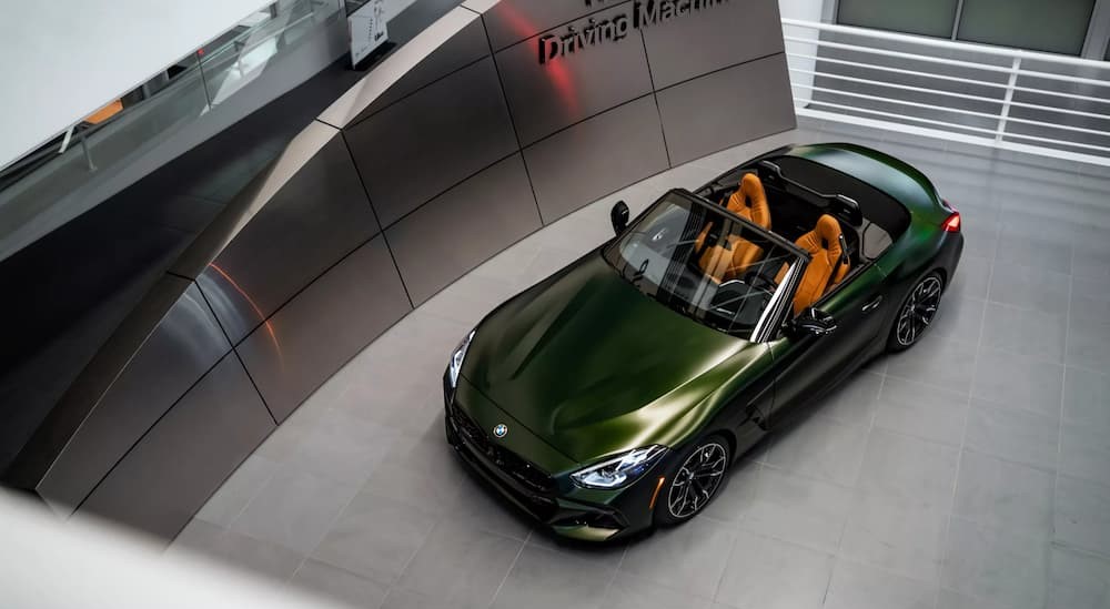 An aerial view of a green 2024 BMW Z4 M40i Roadster is shown.