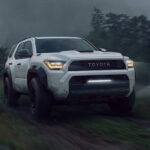A white 2025 Toyota 4Runner for sale is shown from the front at an angle.