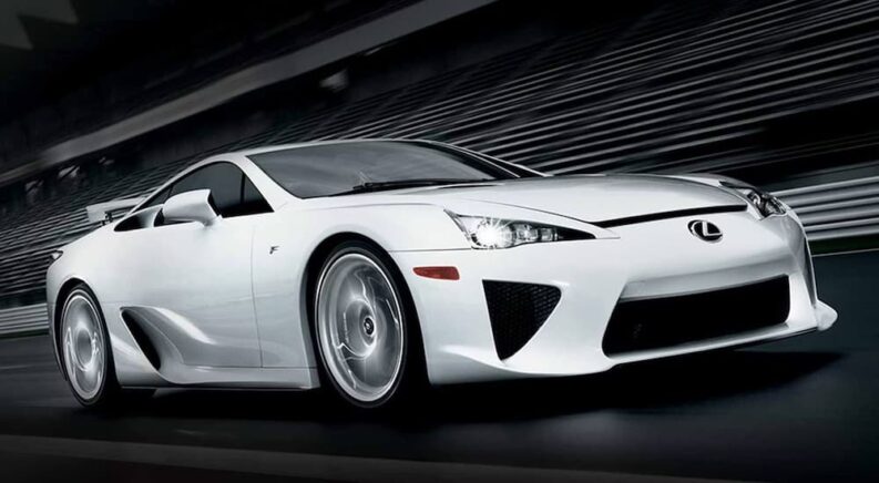 A white 2012 Lexus LFA is shown from the front at an angle.