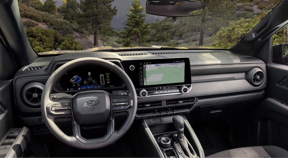 The black interior and dash are shown in a 2024 Chevy Colorado.