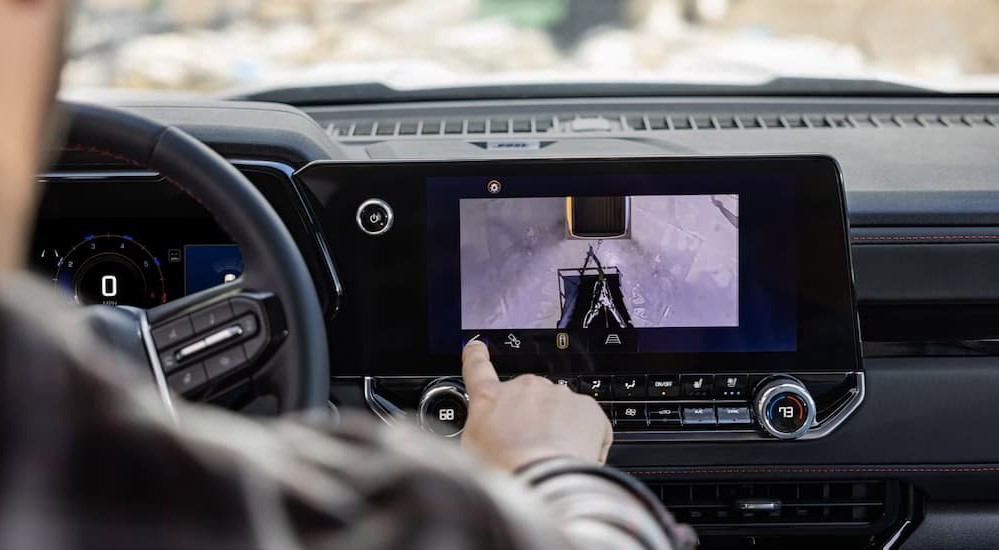 A close-up of the infotainment screen is shown in a 2024 Chevy Colorado for sale.