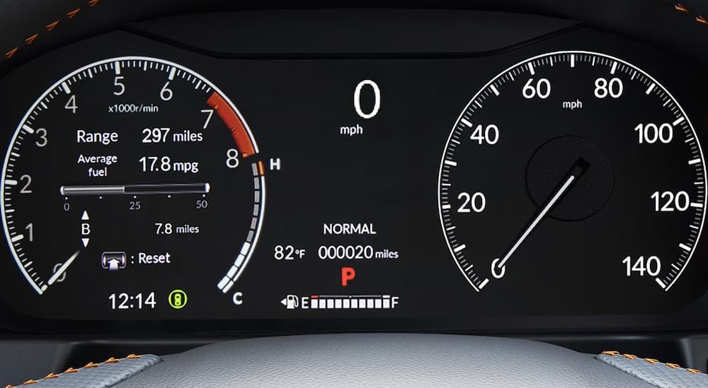 The digital dash display is shown in a 2024 Honda Ridgeline for sale.