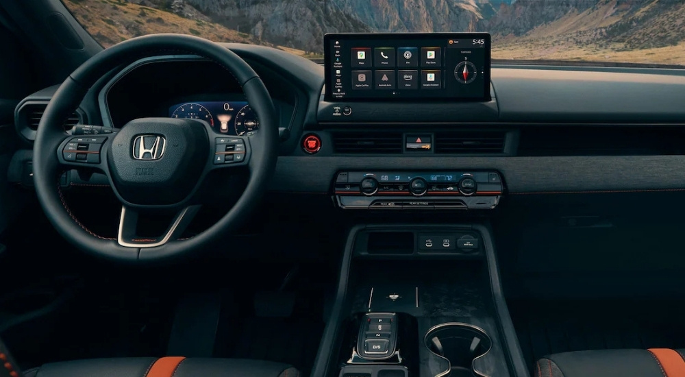 The black interior of a 2026 Honda Passport Trailsport is shown.