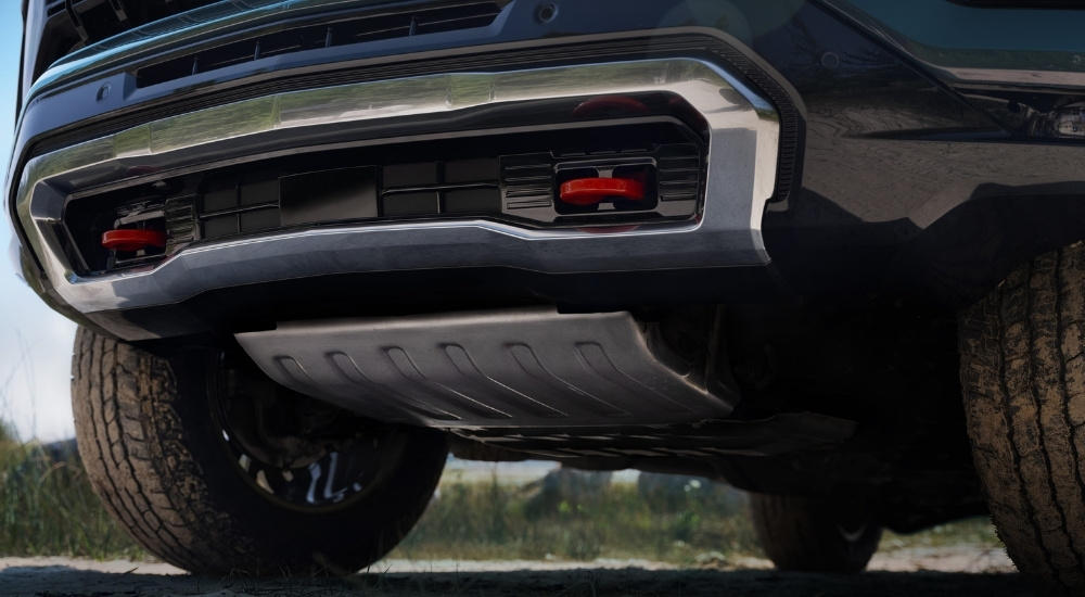 The front of a green 2025 Chevy Tahoe Z71 is shown.