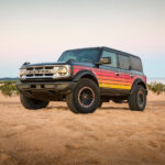 A grey 2025 Ford Bronco Free wheeling Edition is shown from the front at an angle.