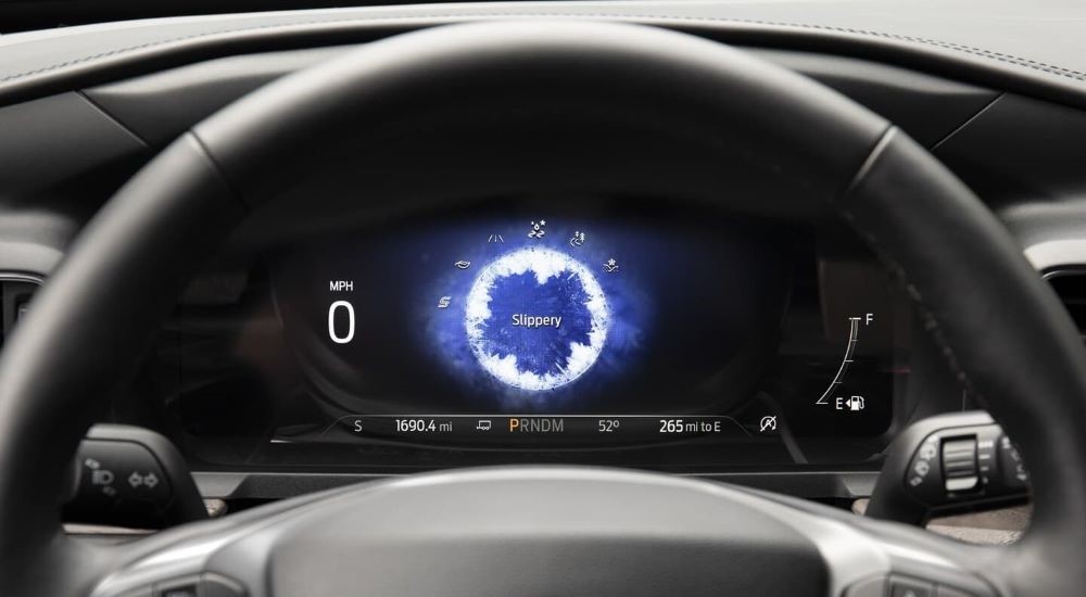 A close-up of the digital dash display is shown in a 2021 Ford Explorer Timberline.