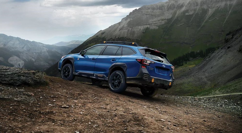 Blue 2023 Subaru Outback Wilderness in mountains