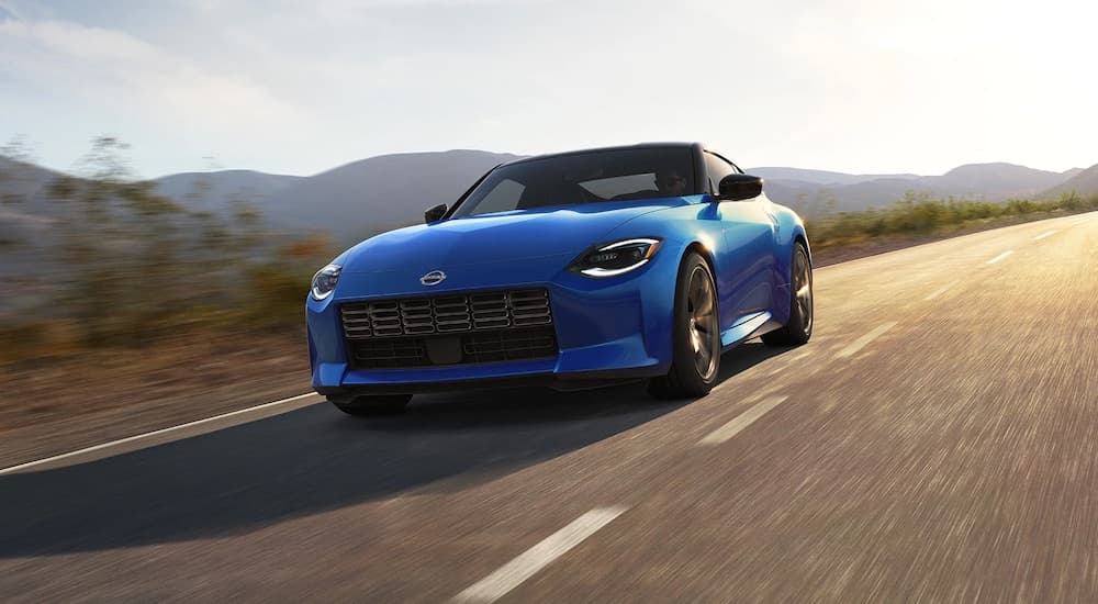 A blue 2025 Nissan Z from the front at an angle.