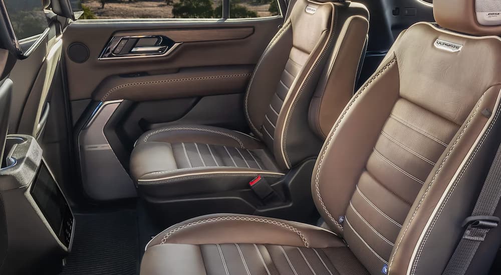 Brown leather 2nd row interior of a 2025 GMC Yukon AT4 Ultimate