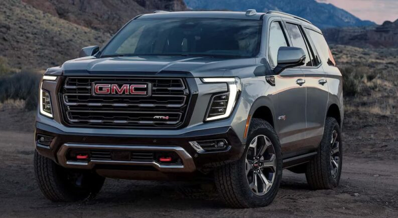 Gray 2025 GMC Yukon AT4 parked off-road