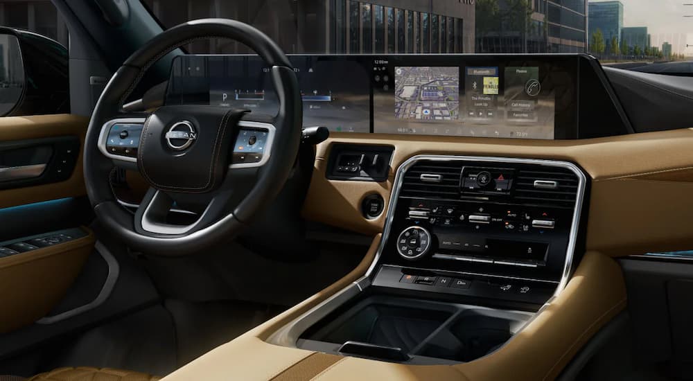 Black and tan interior of a 2025 Nissan Armada at a Nissan dealer near Normal