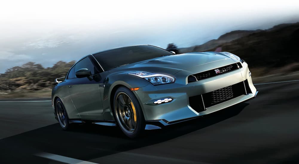 A 2025 Nissan GT-R NISMO driving down a highway