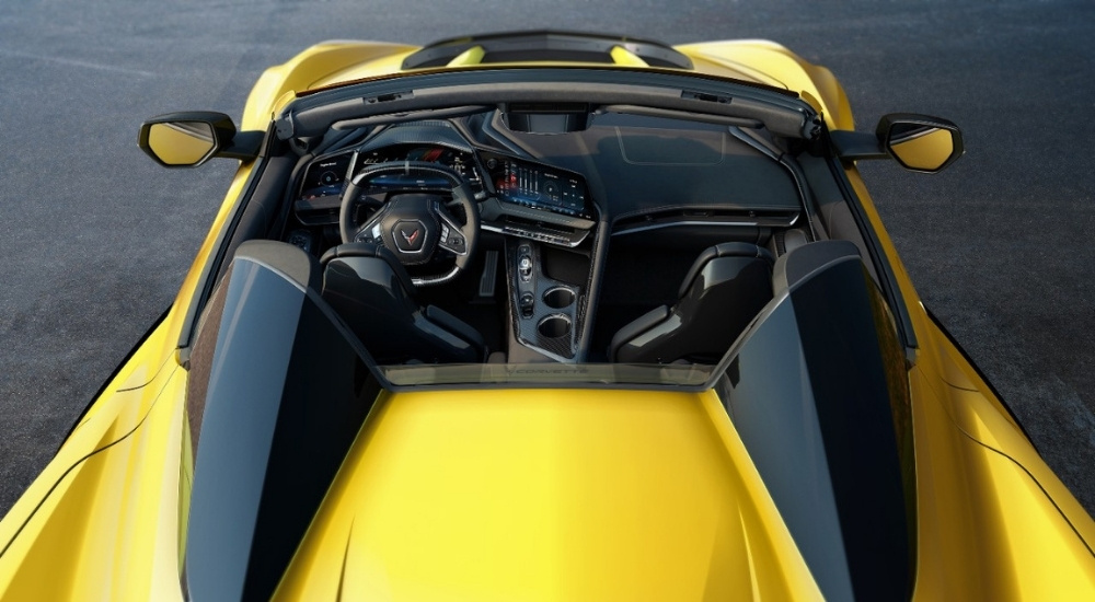 The interior of a yellow 2026 Chevy Corvette.