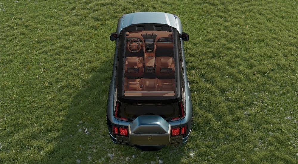 An aerial view of a blue BYD Yangwang U8 Premium Edition and its brown interior.