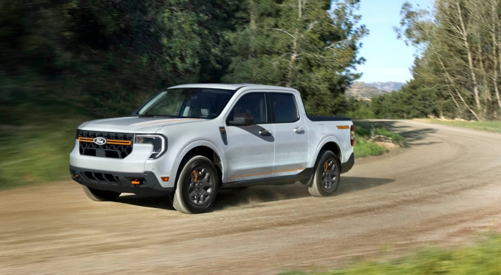A white 2025 Ford Maverick from the side.