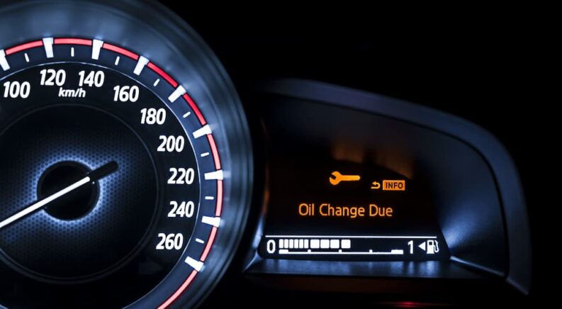 Oil change notification light on a digital gauge cluster