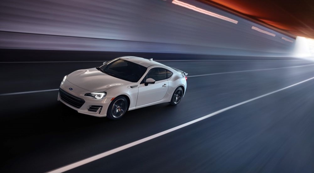 A white 2020 Subaru BRZ driving in a tunnel.